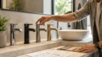 Modern Melbourne bathroom renovation with chrome, matte black, brushed nickel, and brass tapware displayed beside a stone vanity and basin.